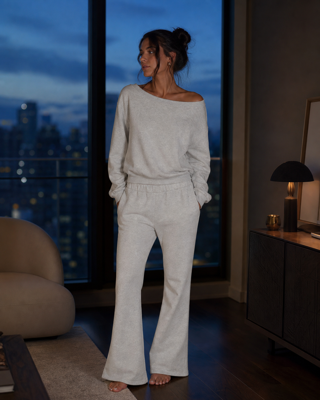 A model wearing the Flower Gray Off-Shoulder Flare After Hours look