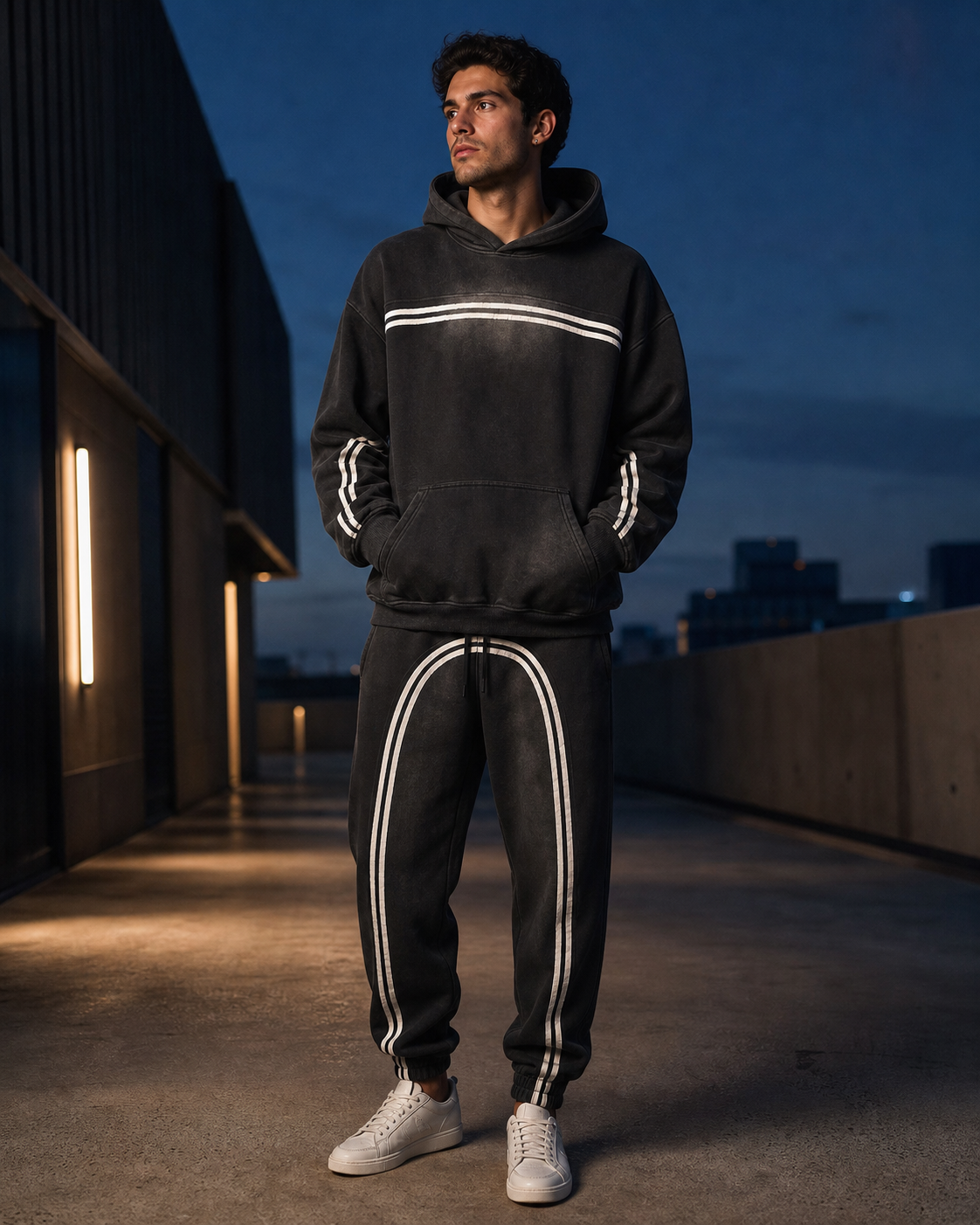 A model wearing the Black Sun-Fade Track Set After Hours look